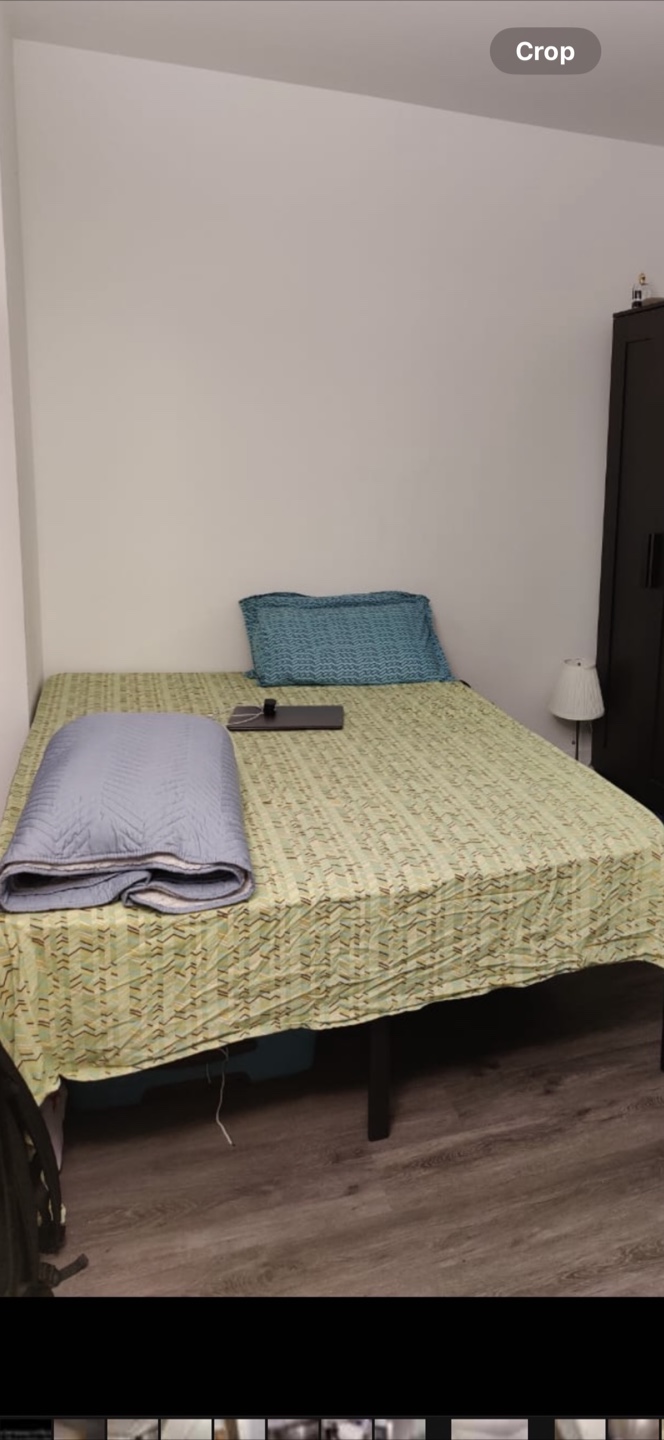 Double bed steel frame with mattress.
