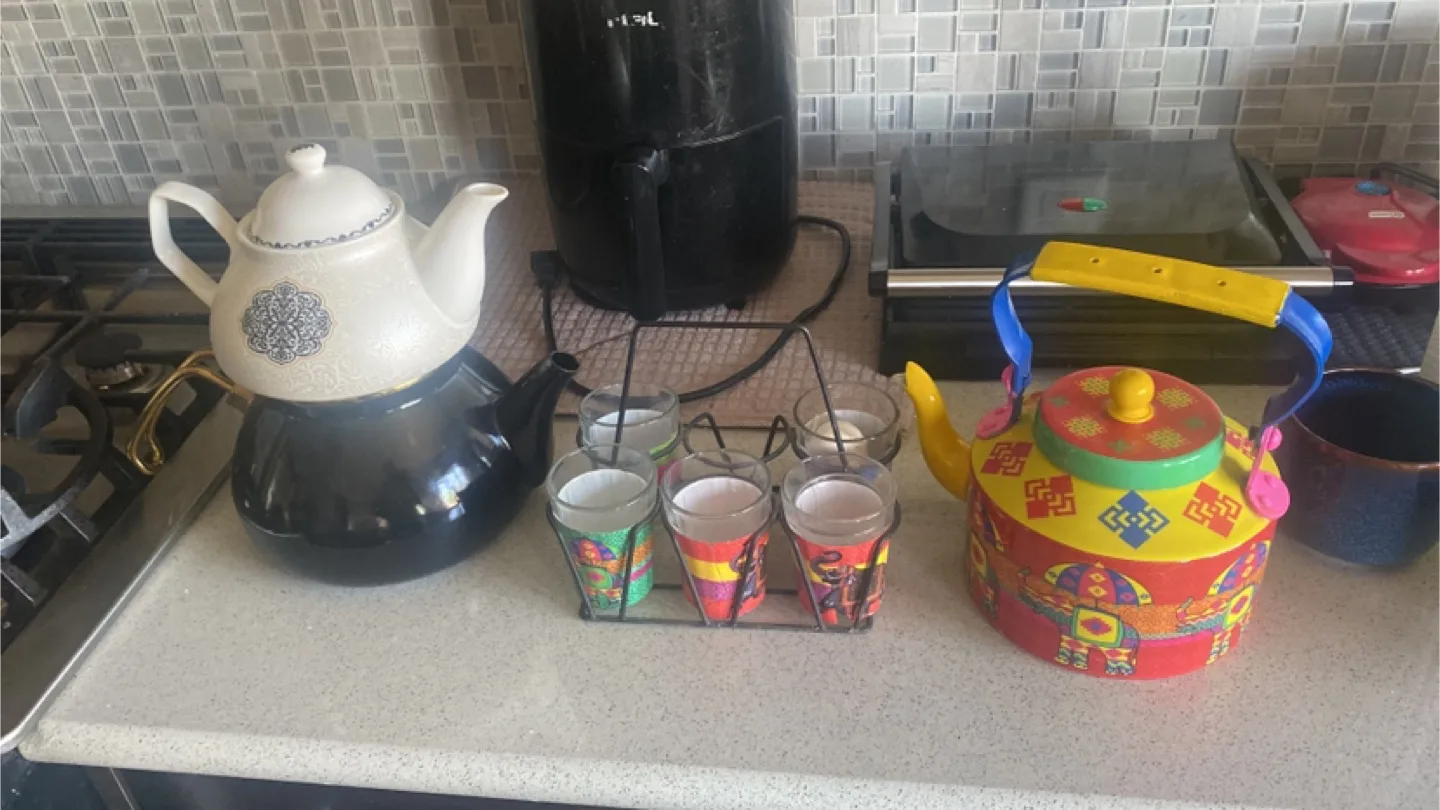 Two Tea Kettles and Tea Cups thumbnail