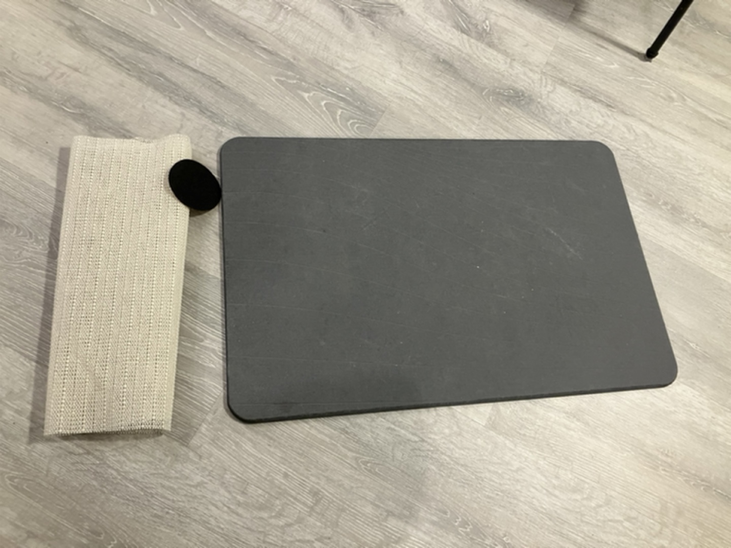 Stone bath mat.