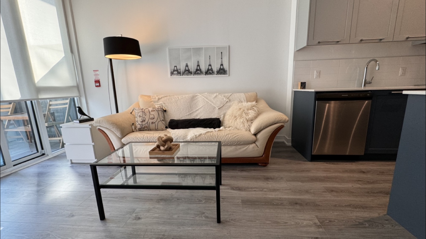 Cream Leather Sofa & Glass Coffee Table