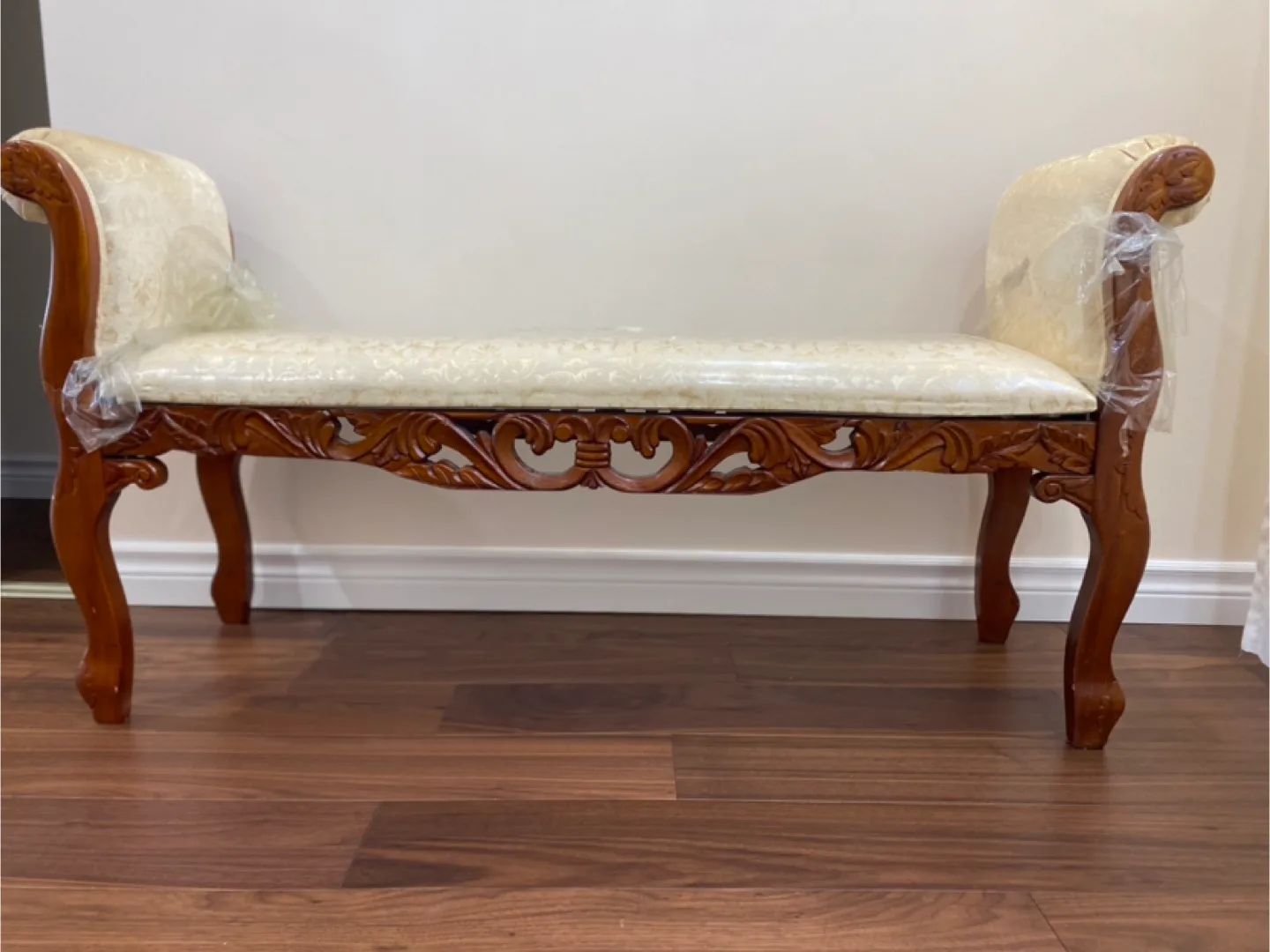Ornate Wooden Bench with Upholstered Seat thumbnail