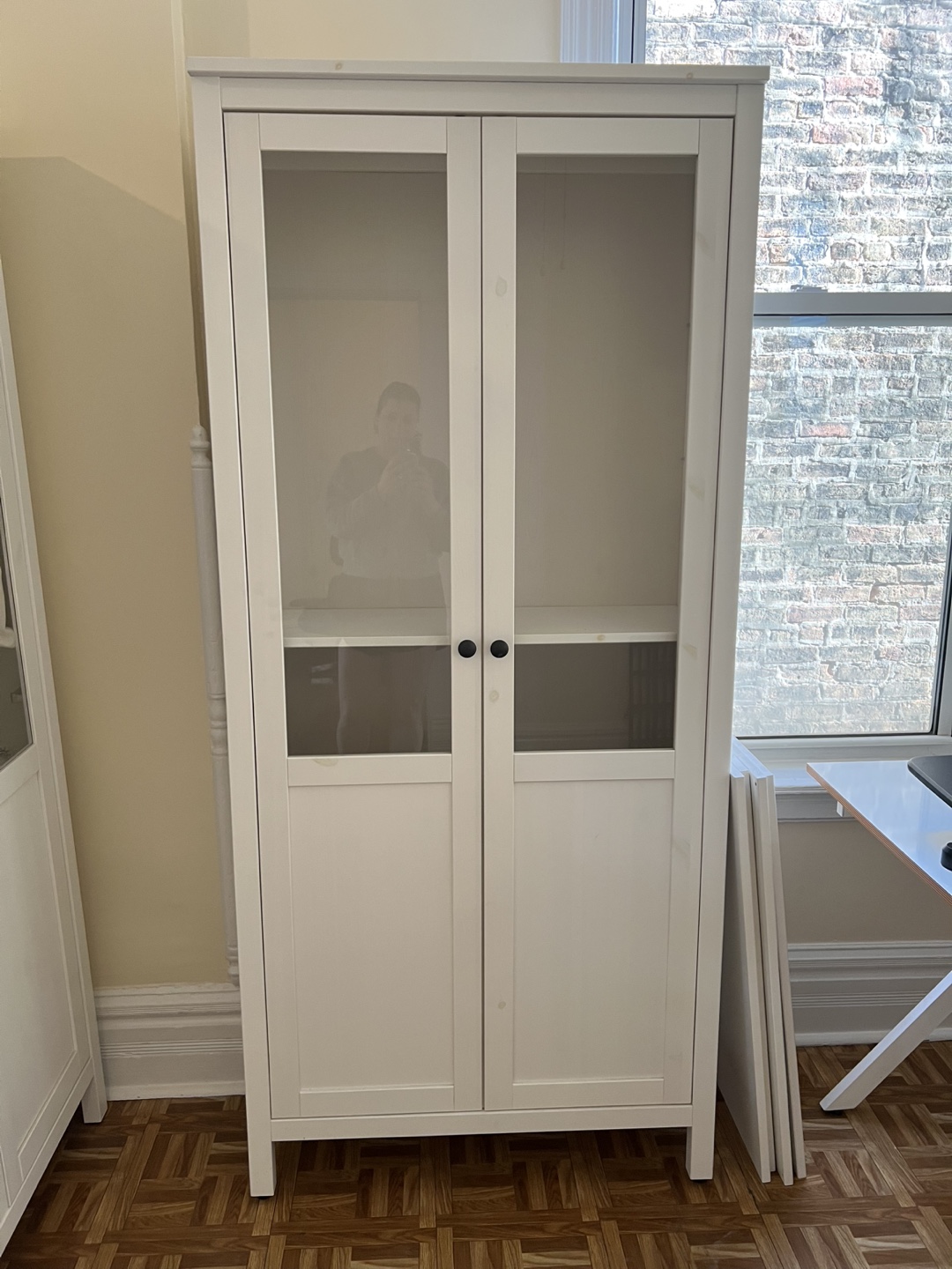 White Wooden Cabinet with Glass Doors (IKEA Hemnes)