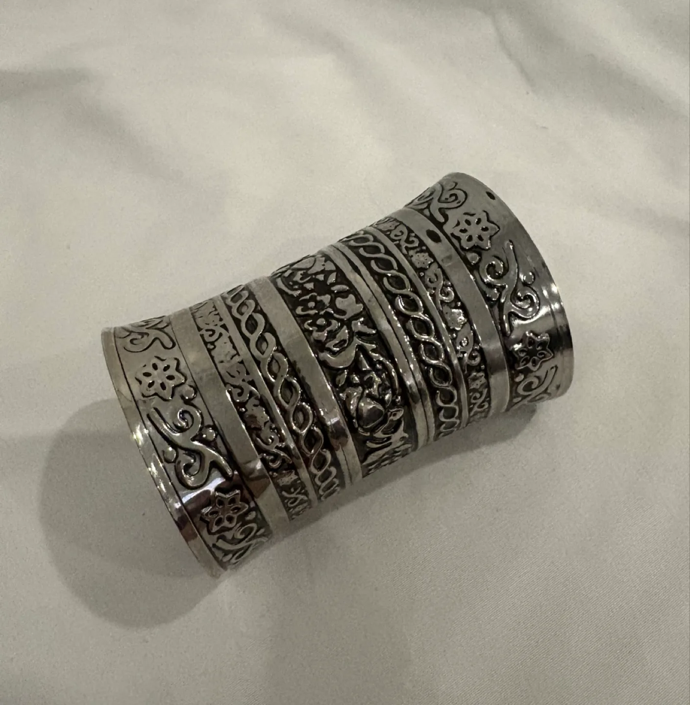 Silver Metal Cuff Bracelet with Intricate Floral Design thumbnail