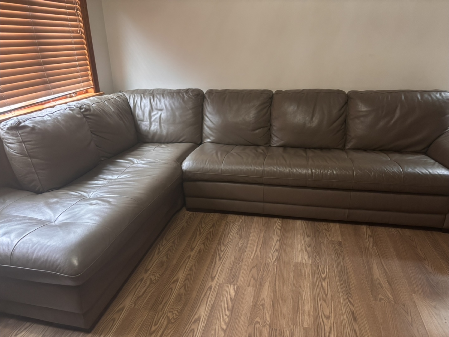 Raymour & Flanigan Brown Leather couch with Ottoman