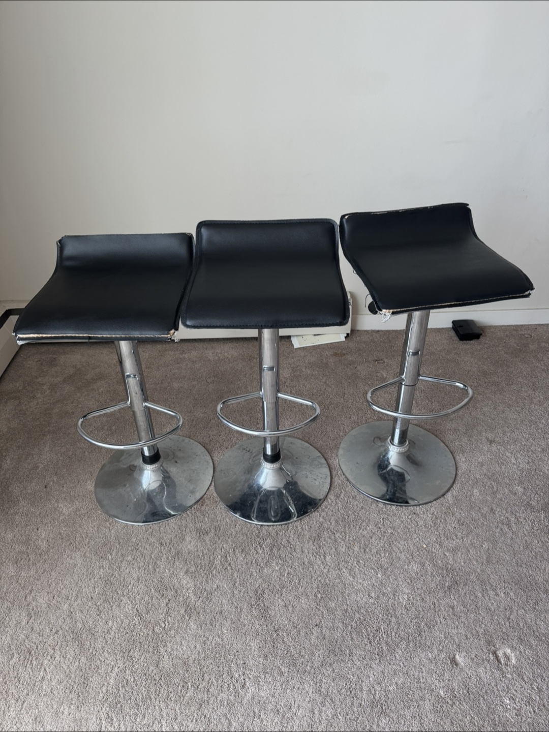 Three Black Bar Stools
