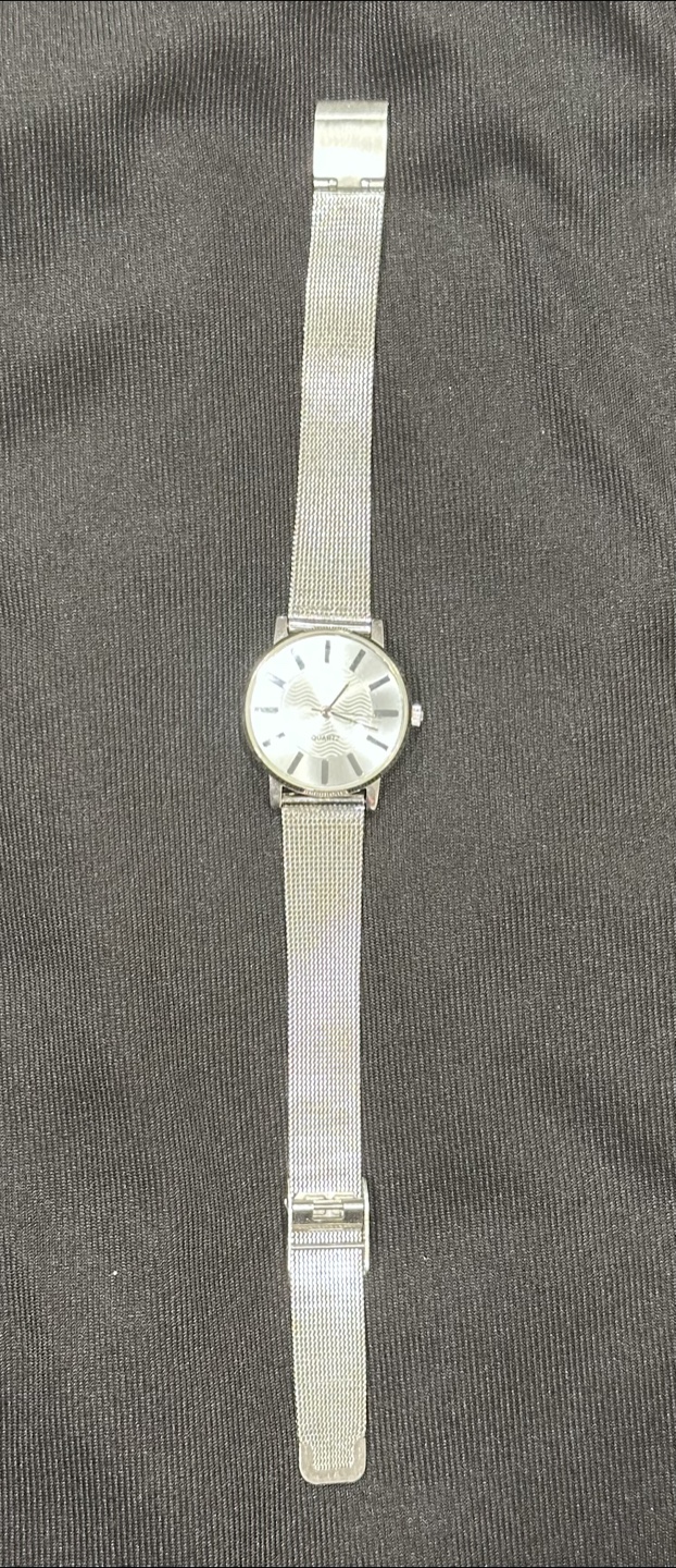 Silver women's watch with metal band