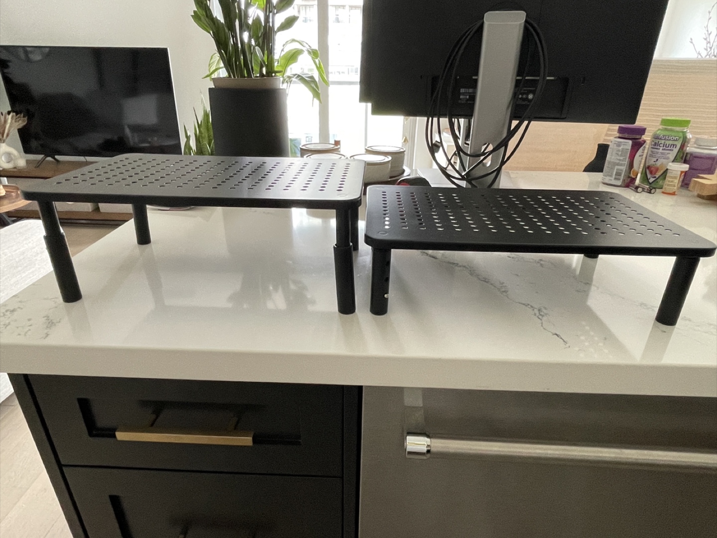 Two Black Monitor Risers
