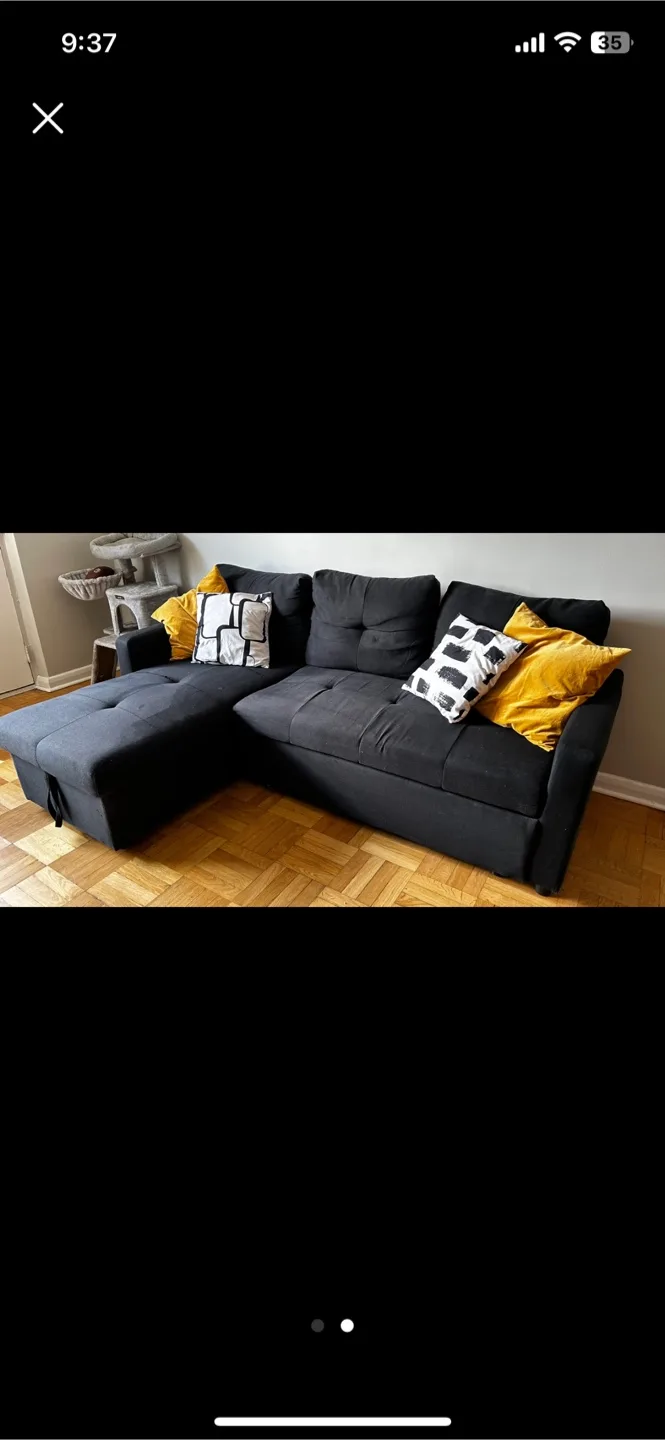 Black L-pull out couch- small damage! thumbnail