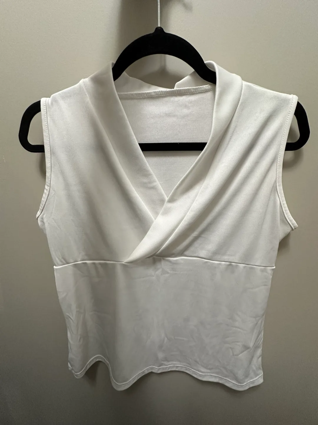 Women's White Sleeveless V-Neck Blouse thumbnail