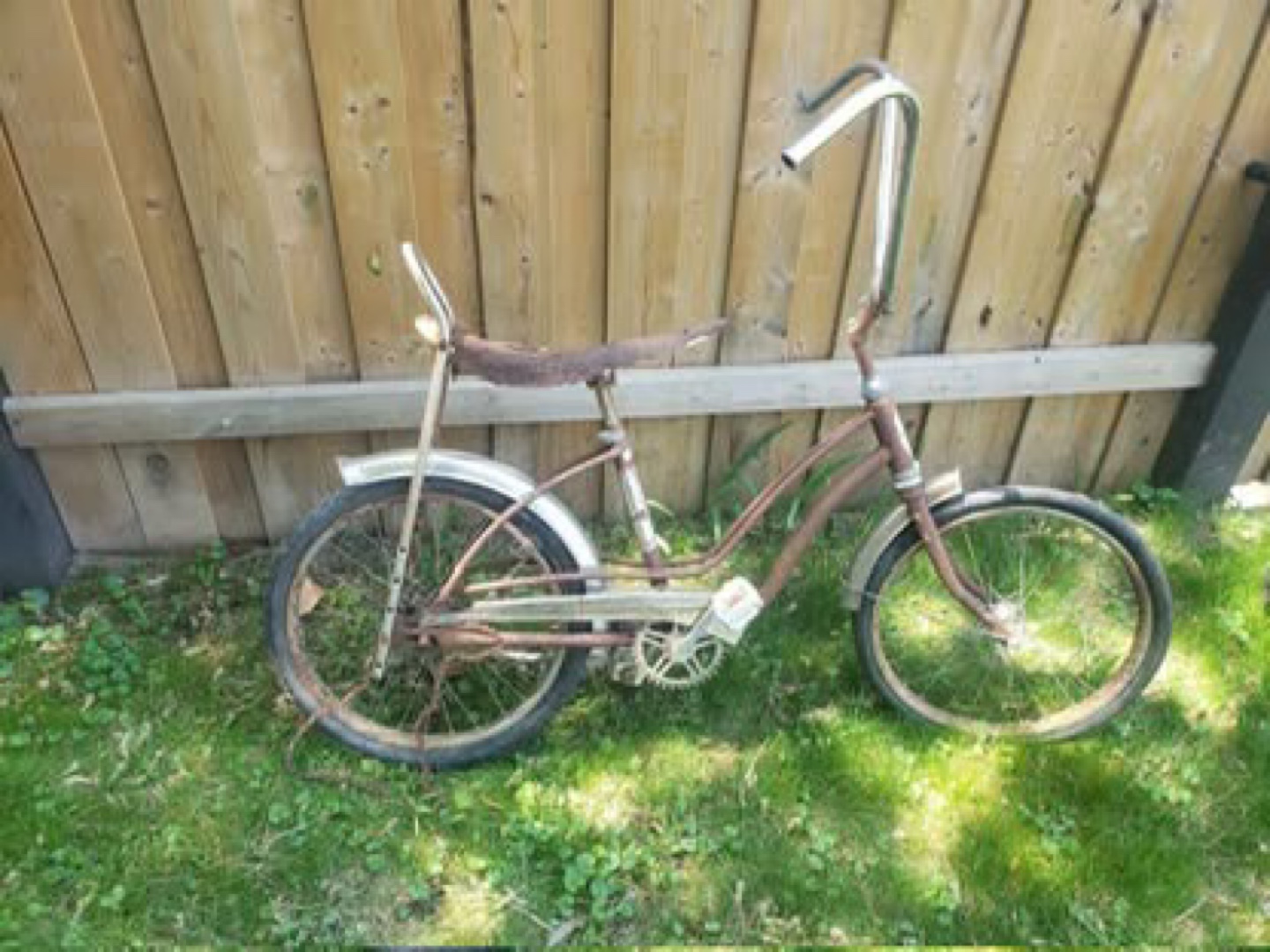 Vintage Rust-Orange Bicycle and Tricycle