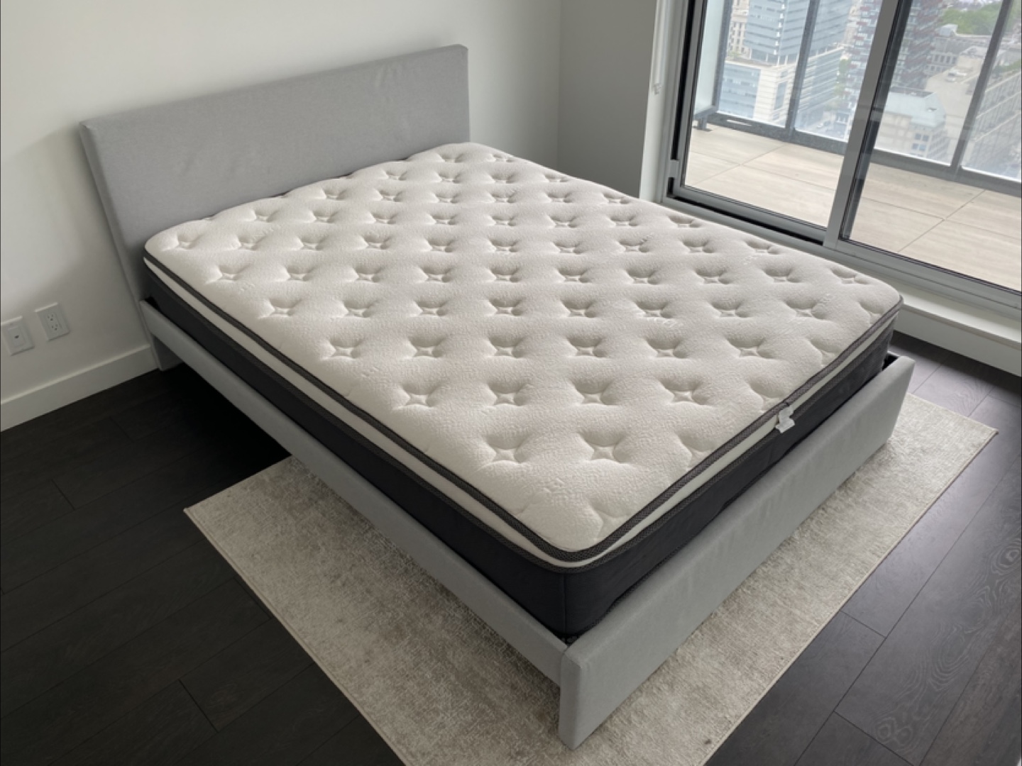 Queen-size bed frame and mattress