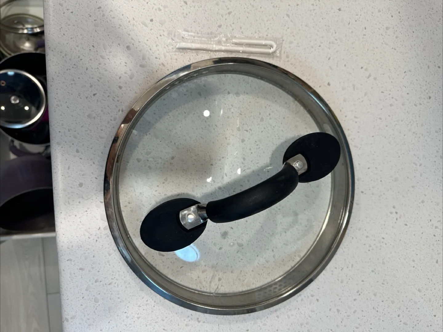 Glass pot lid with black handle thumbnail