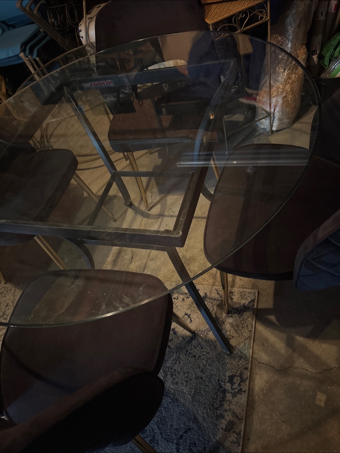 Round glass crate and barrel table and 4 chairs