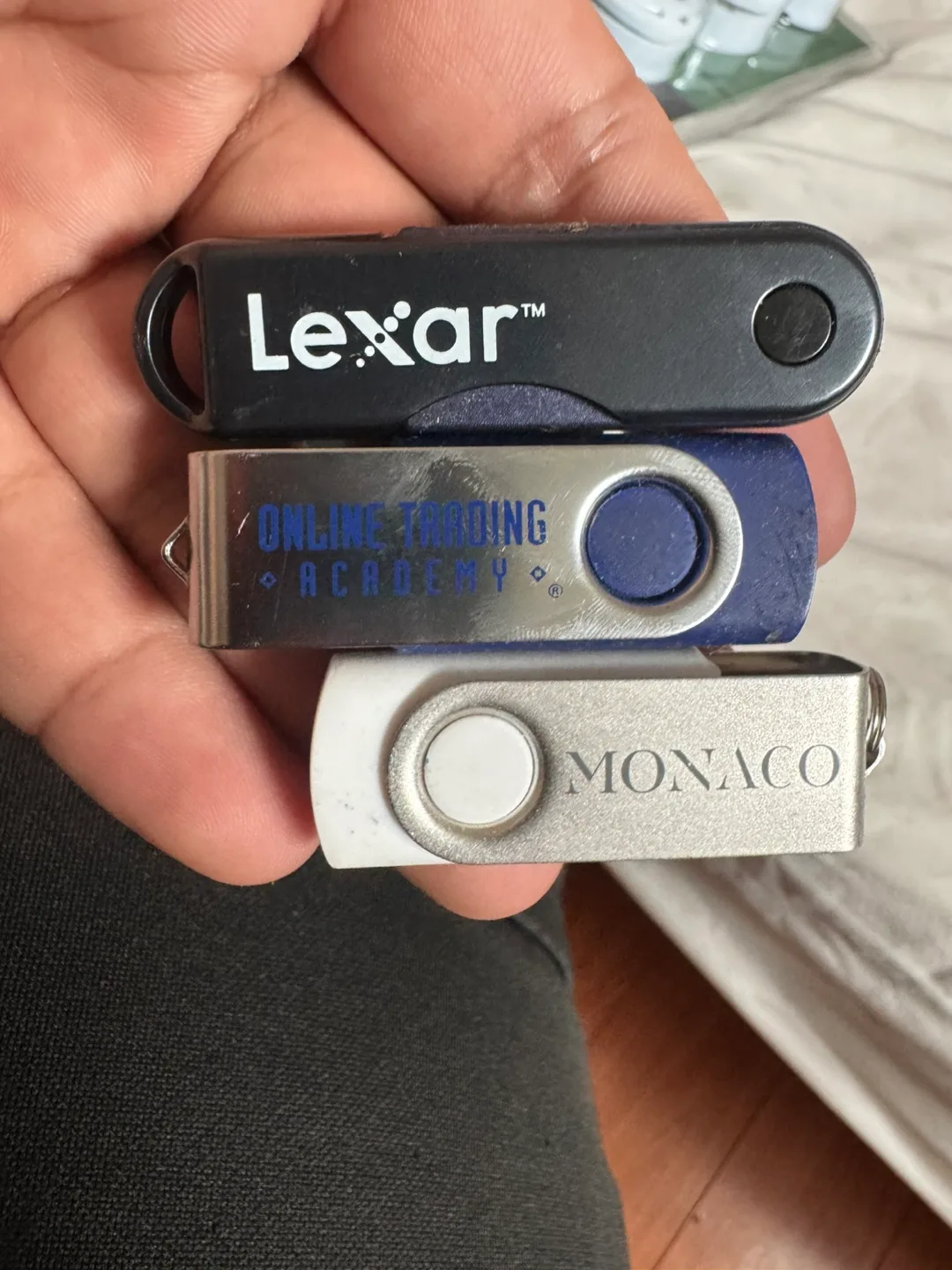 Three USB Flash Drives: Lexar, Online Trading Academy, Monaco thumbnail