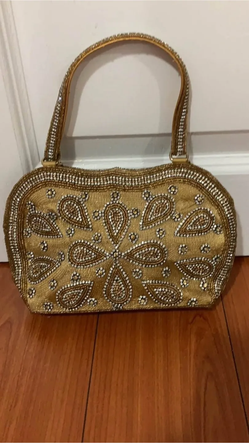 Three Stylish Handbags - Black, Gold, and Patterned thumbnail