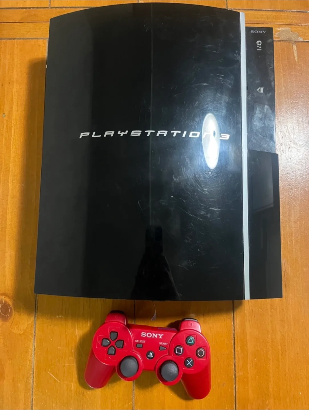 Sony PlayStation 3 Console with Red Controller thumbnail