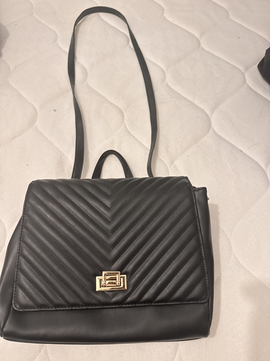 Black quilted backpack purse