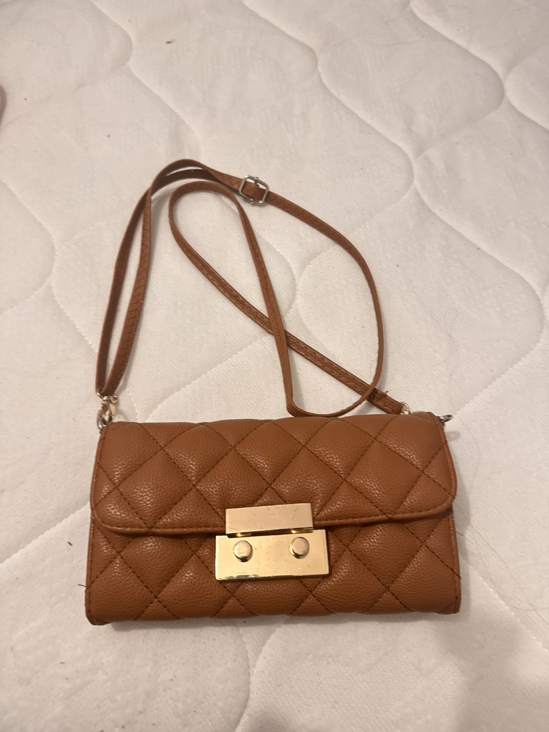 Brown quilted crossbody bag