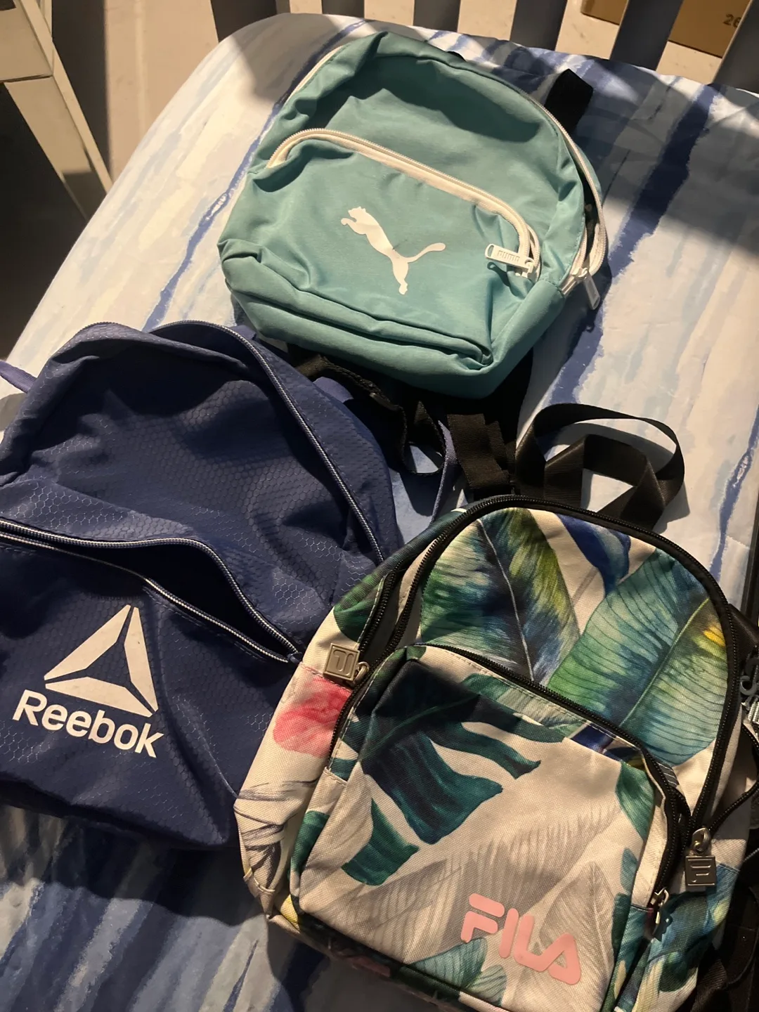Three Mini Backpacks - Fila, Puma, Reebok thumbnail