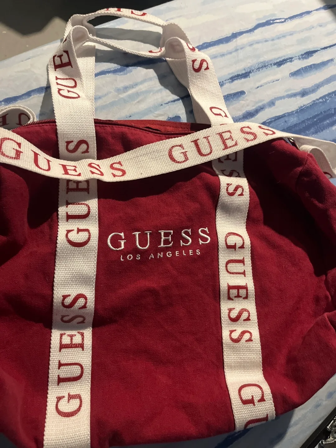Red Guess duffel bag image indicator(2)