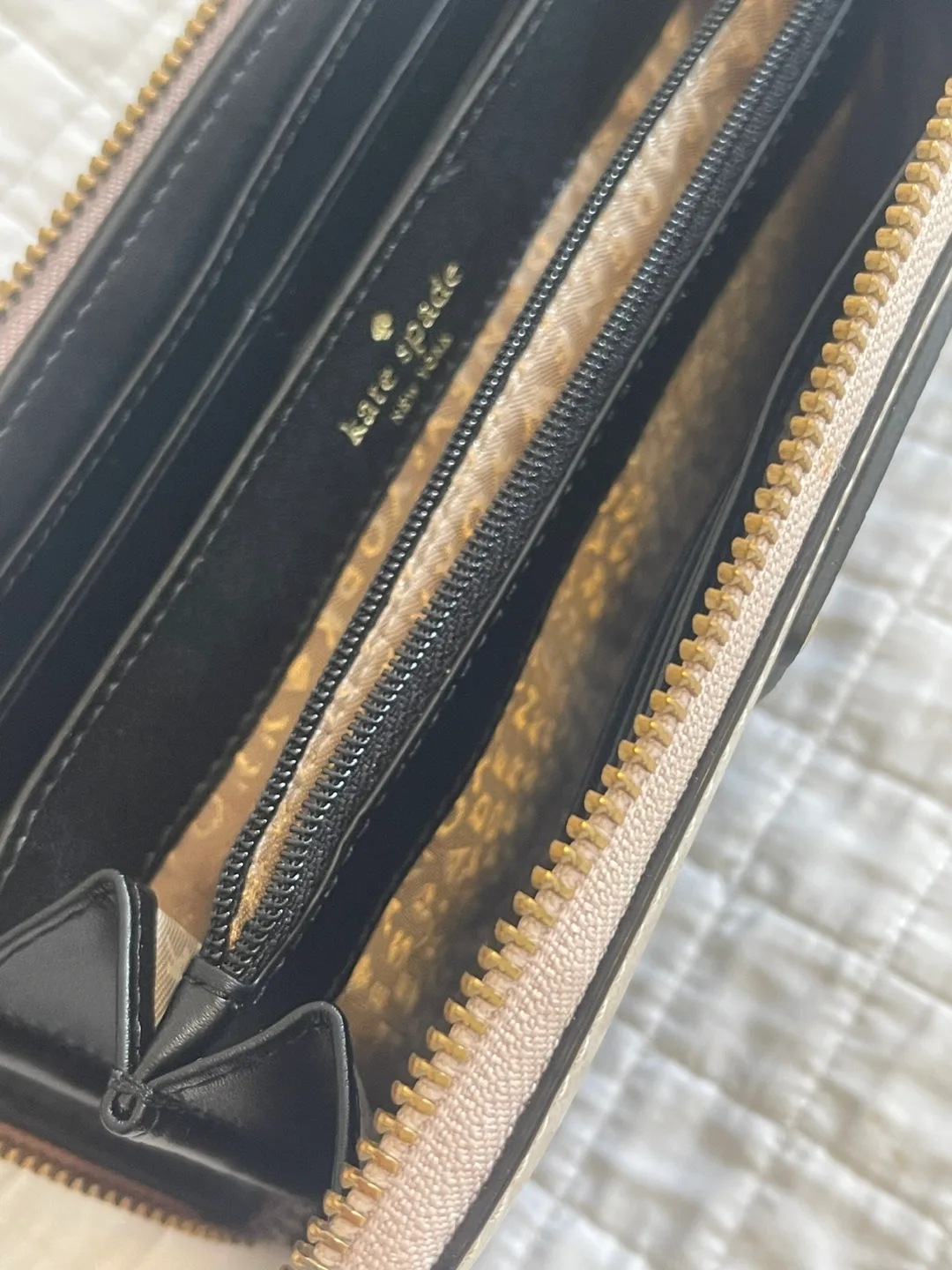 Kate Spade New York Two-Tone Zip Around Wallet image indicator(7)