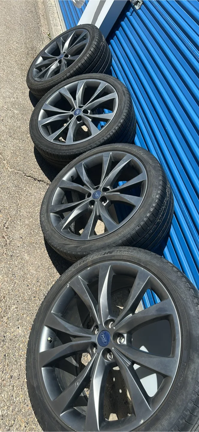 Set of 4 Used Tires on Rims thumbnail