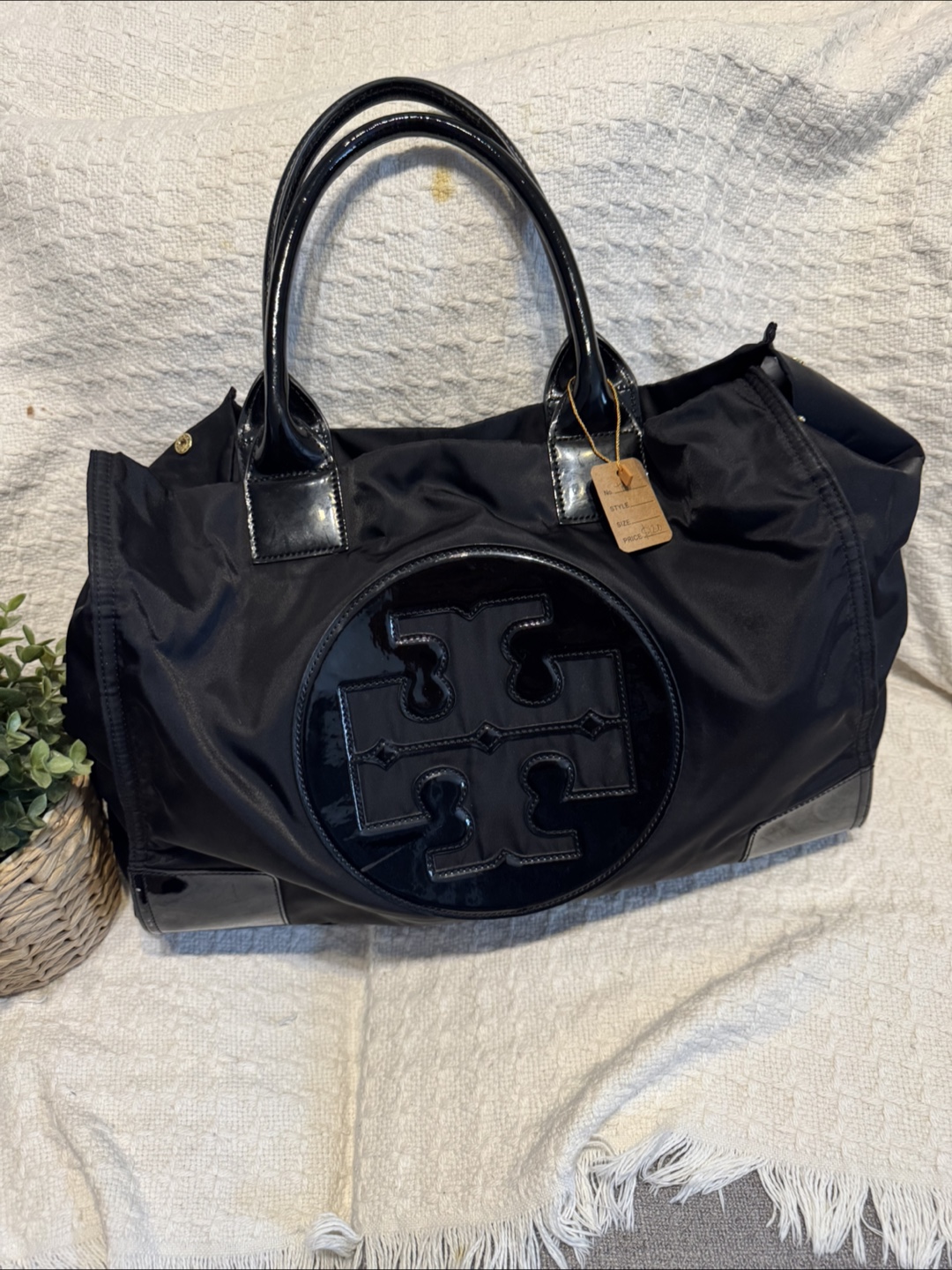 Tory Burch Black handbag with glossy details