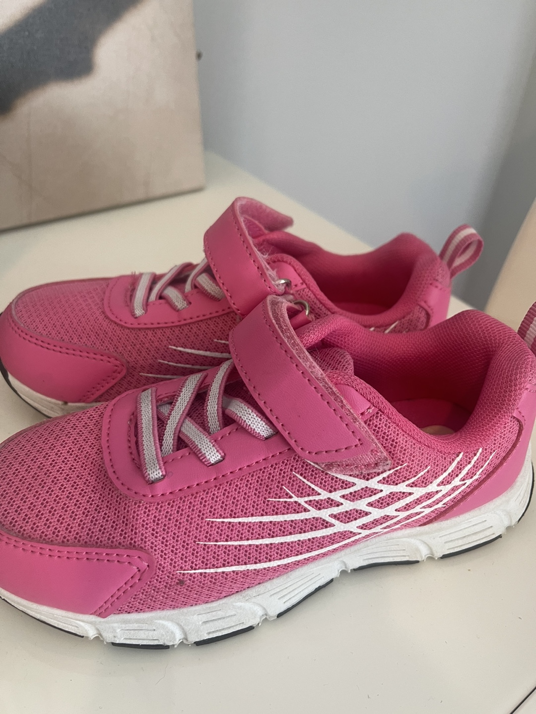 Pink mesh running shoes