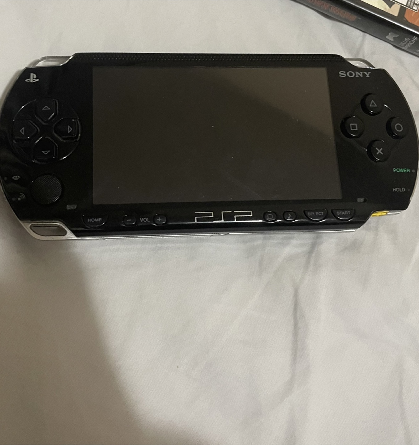 PSP Bundle: Console, Charger & 3 Games