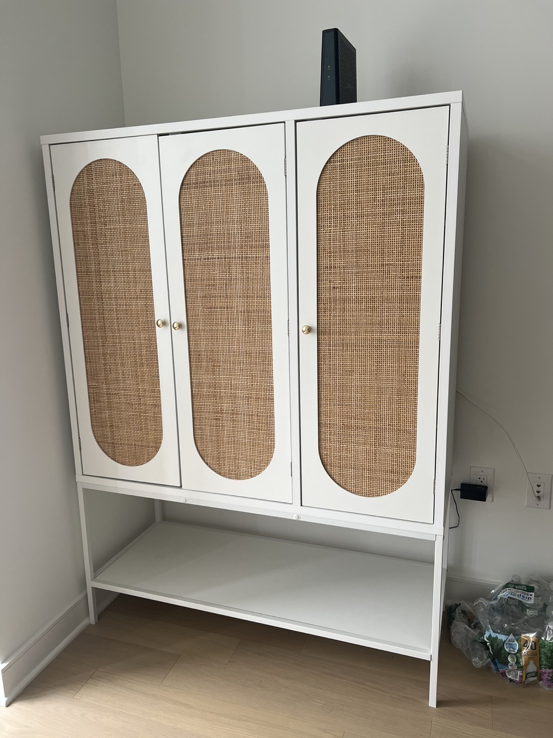 White Cabinet with Woven Cane Doors