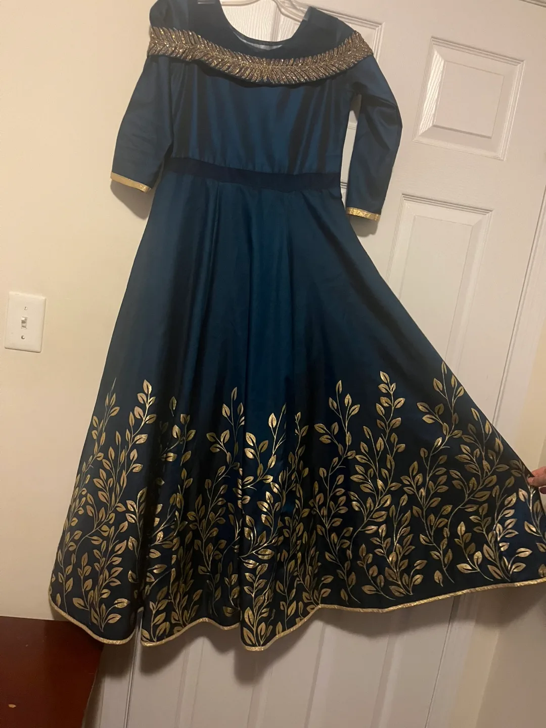 Elegant Teal Dress With Gold Details image indicator(3)