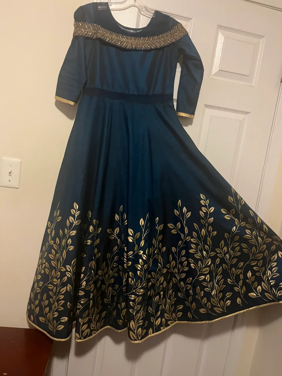 Elegant Teal Dress With Gold Details image indicator(2)