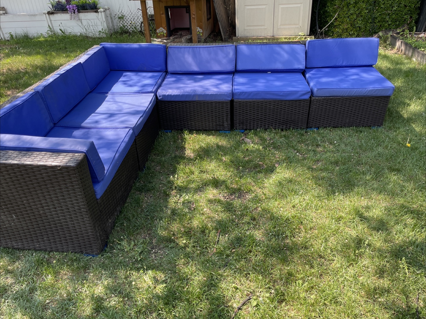 Outdoor sectional with blue cushions