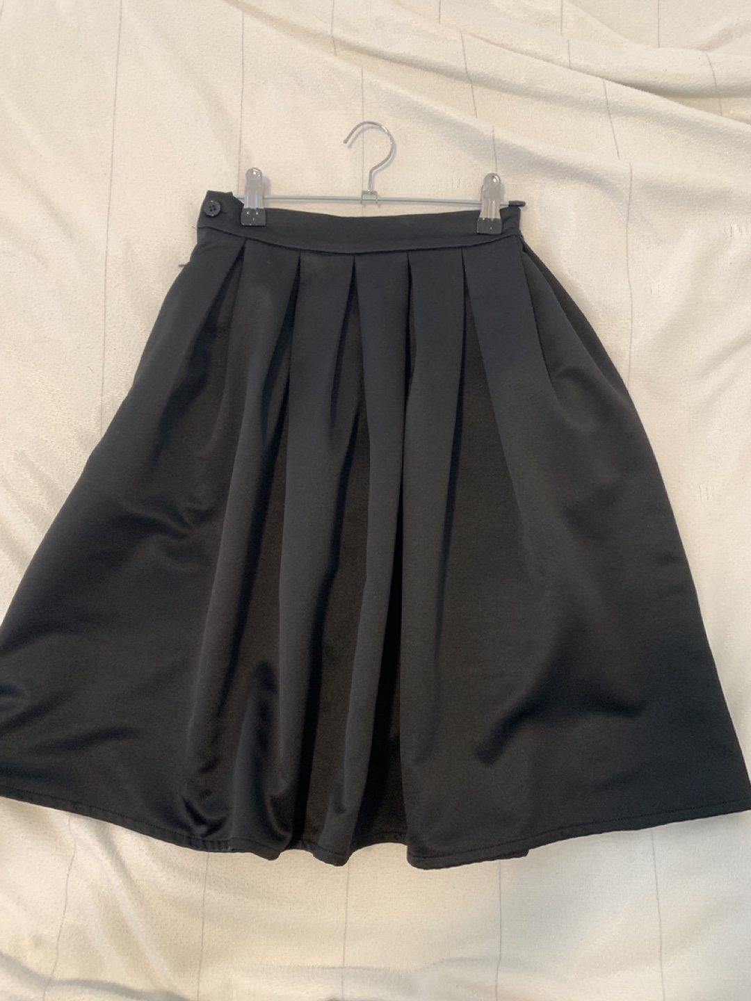 Black pleated midi skirt