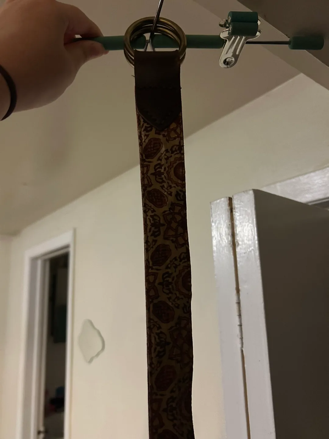 Decorative patterned belt with large brass ring thumbnail