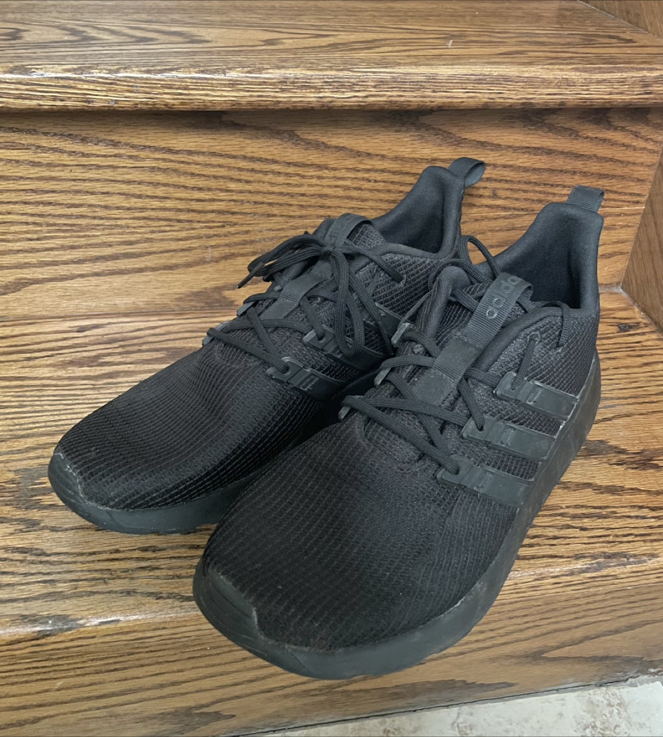 Black Adidas sneakers