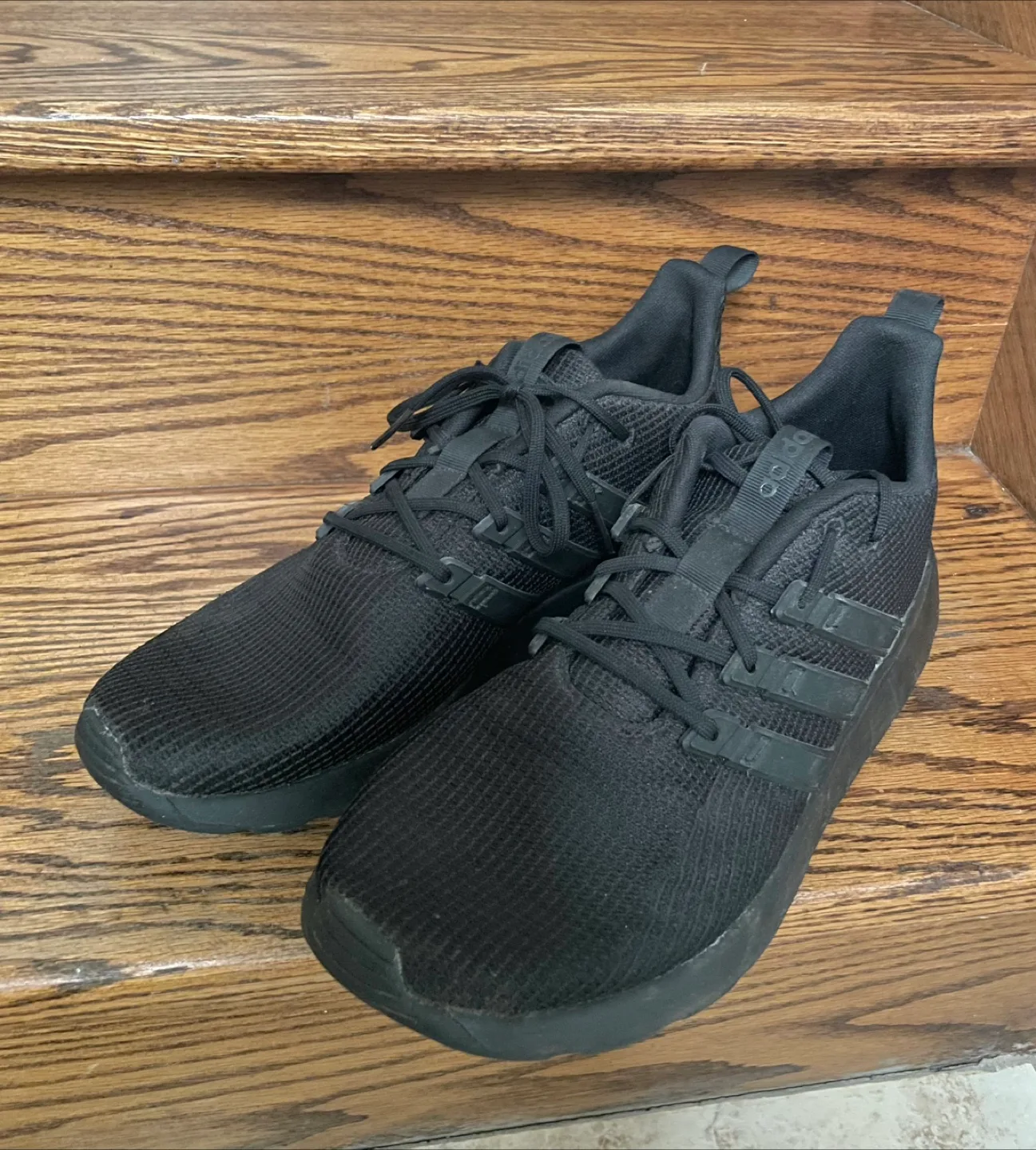 Black Adidas sneakers thumbnail