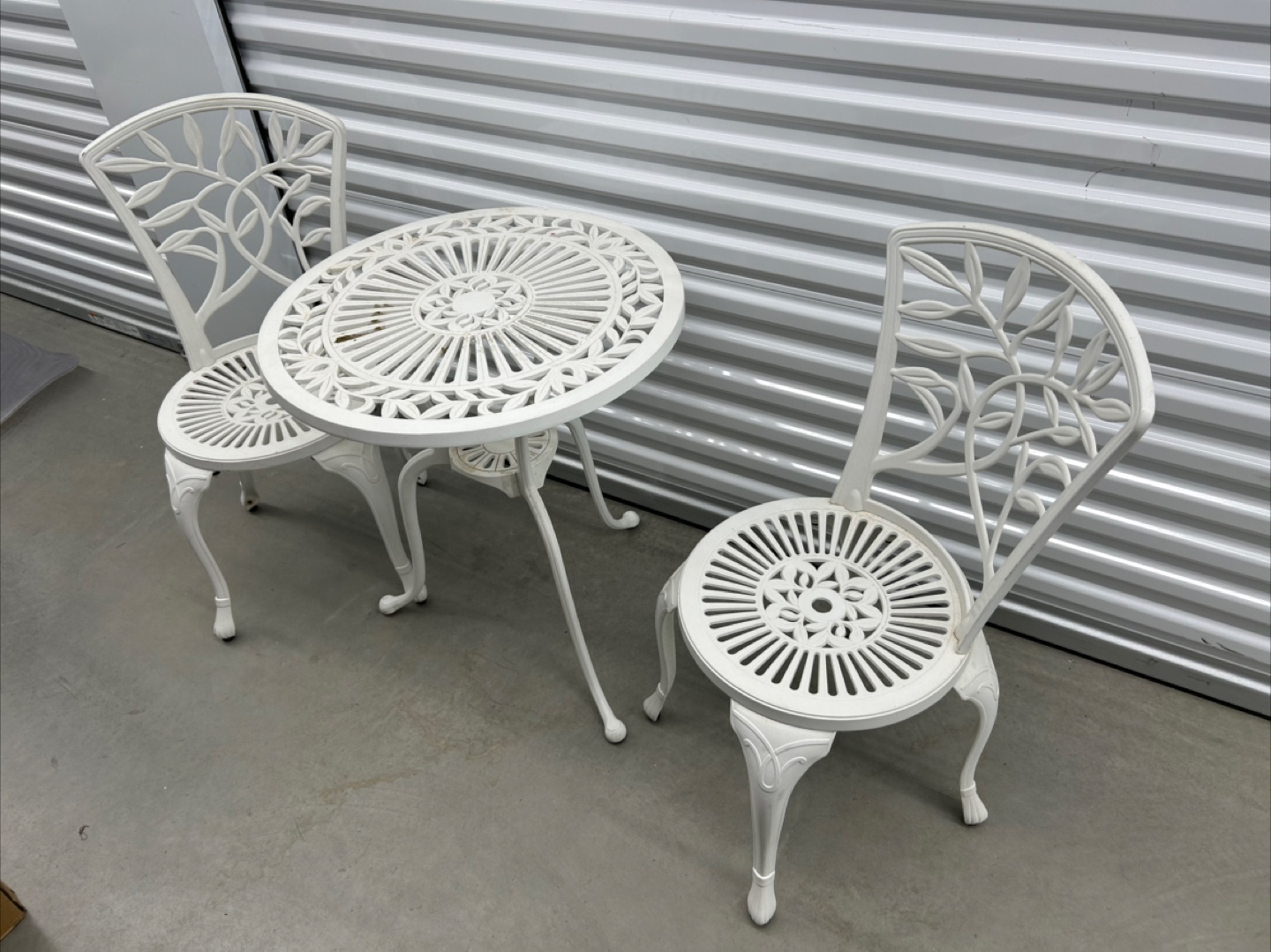 White patio table and chair set