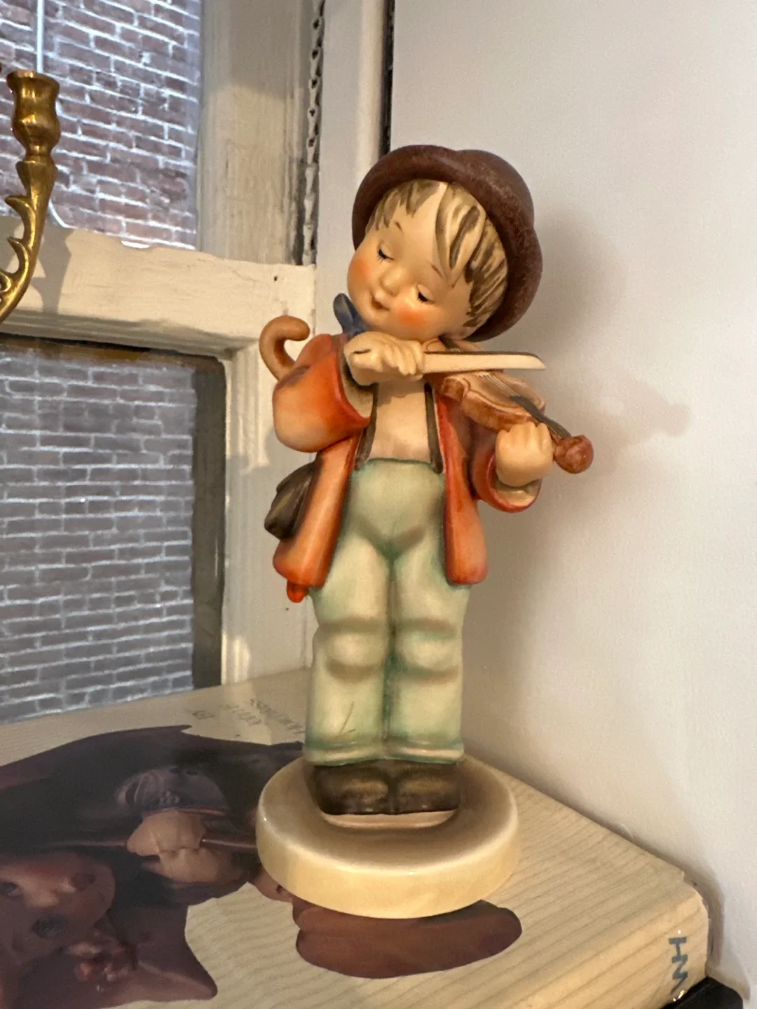 Vintage Figurine of a Boy Playing the Violin image indicator(2)