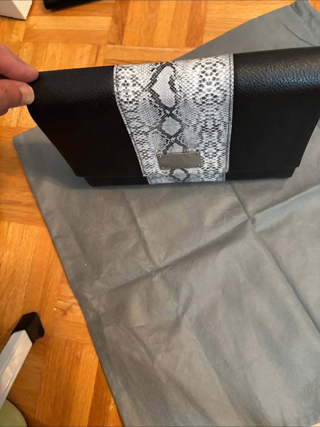 Black Clutch With Snake Skin Detail image indicator(2)