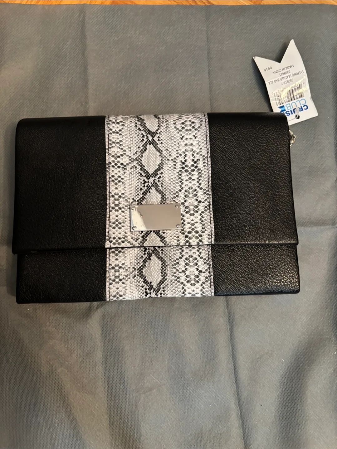 Black Clutch With Snake Skin Detail image indicator(3)
