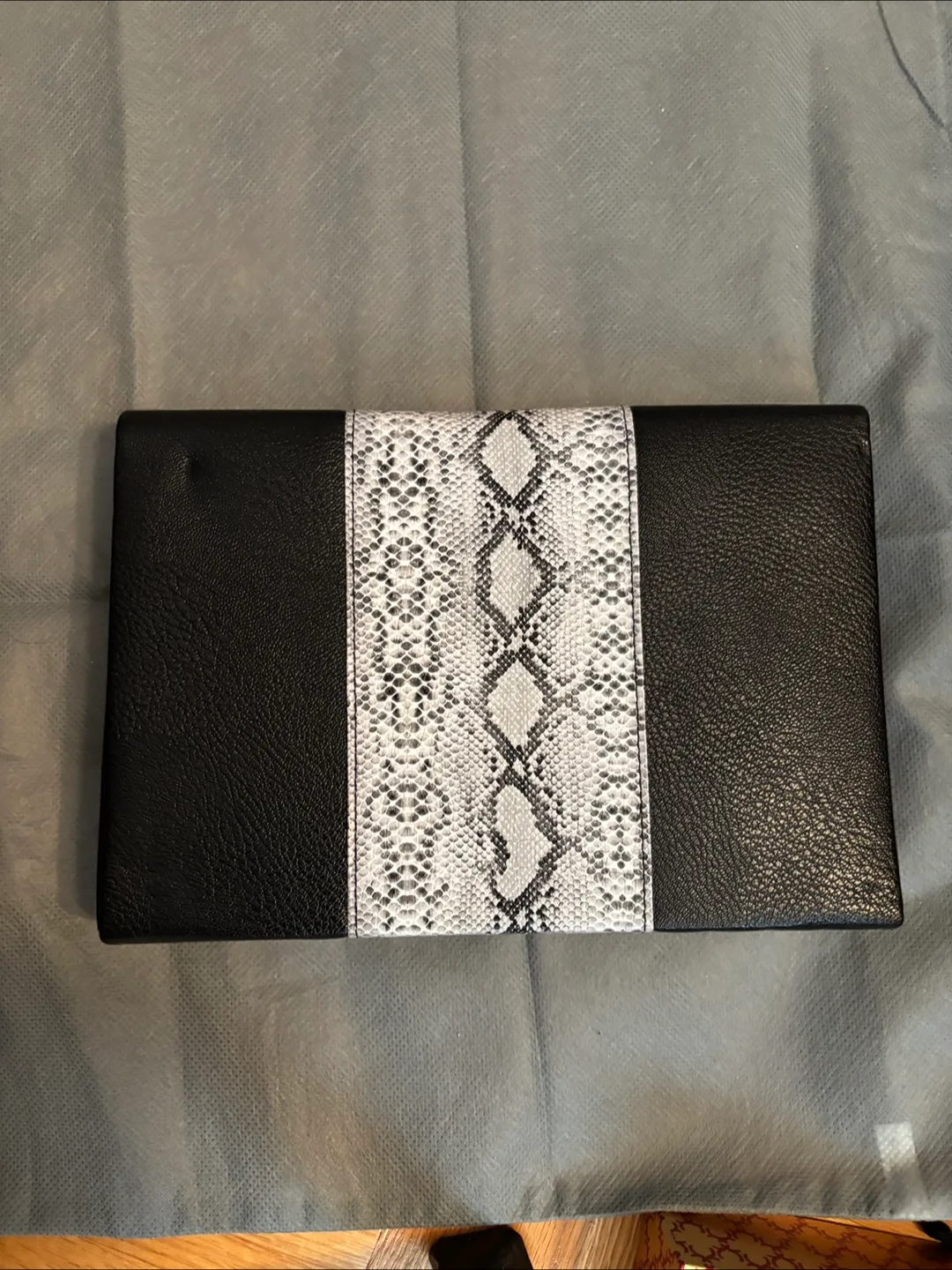 Black Clutch With Snake Skin Detail image indicator(4)