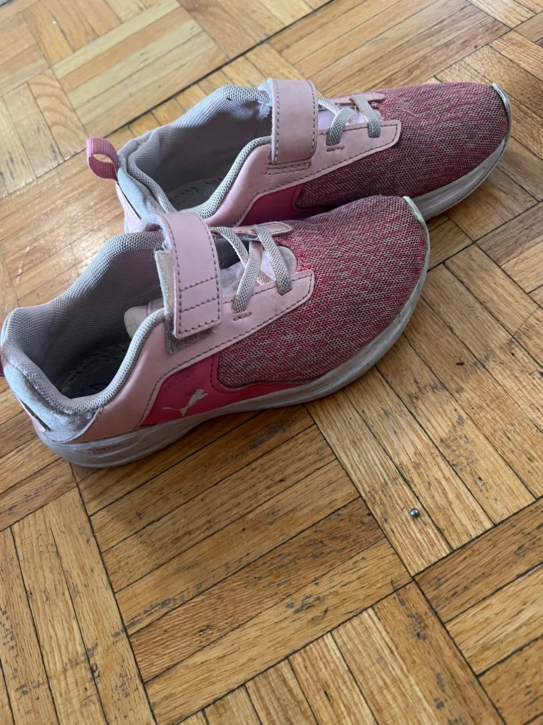 Pink athletic shoes thumbnail