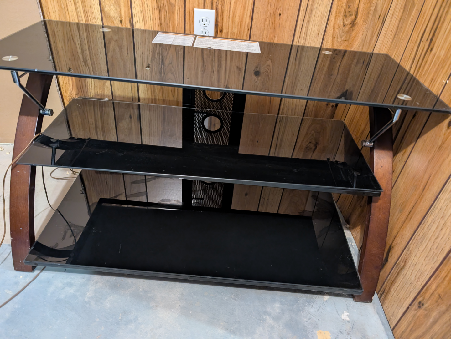 Three-shelf black glass TV stand