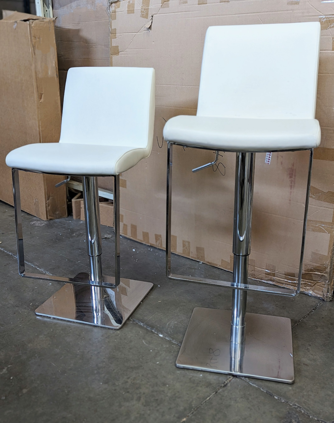 Pair of White Leather Adjustable Height Bar Stools