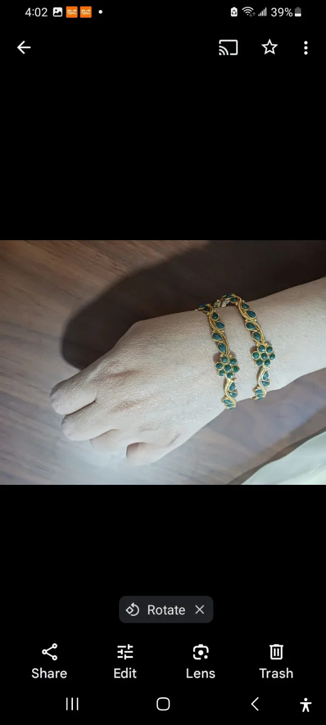 Pair of Gold Bangles with Green Stones thumbnail