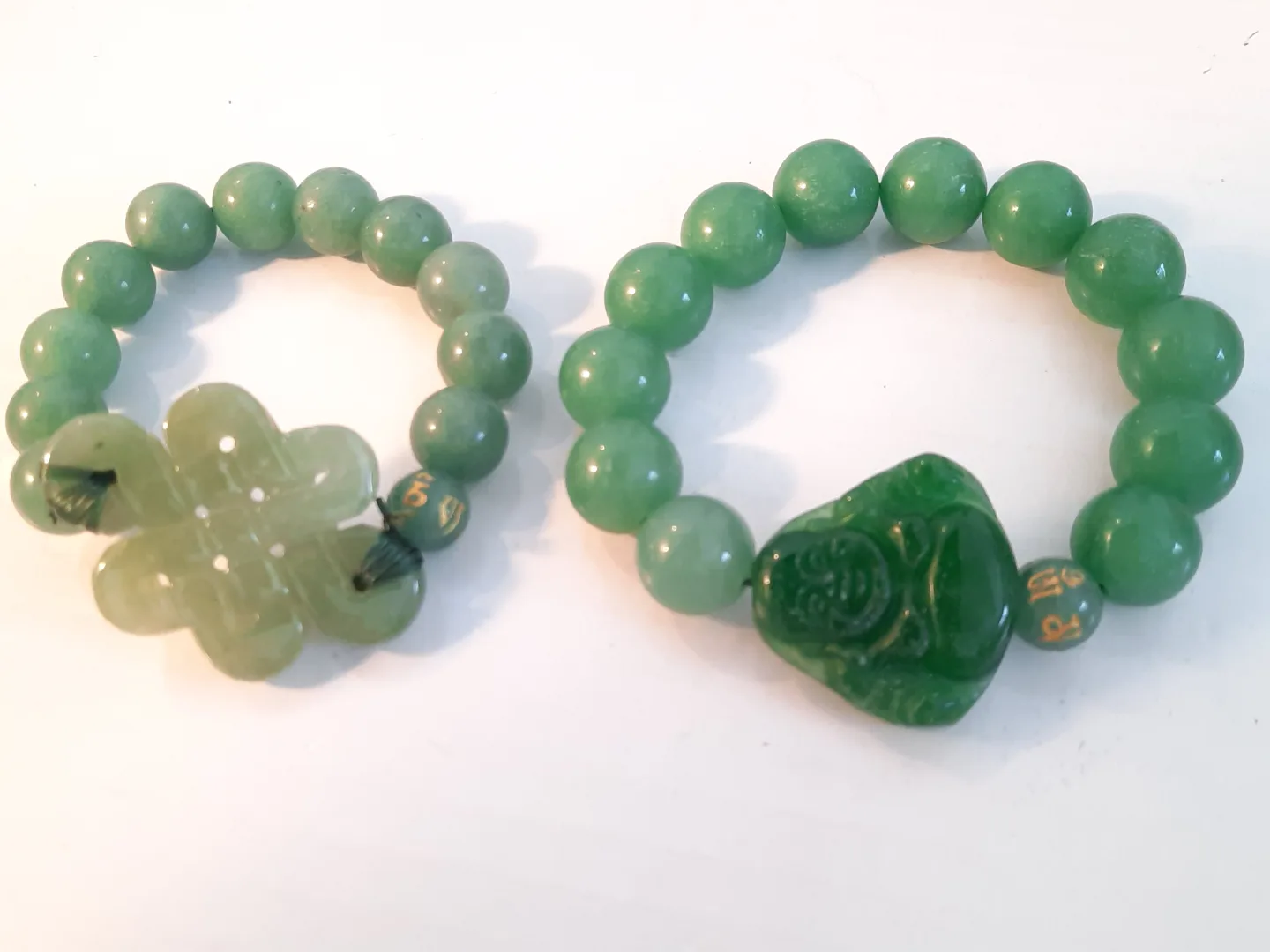 Pair of Green Jade Bracelets with Charms thumbnail