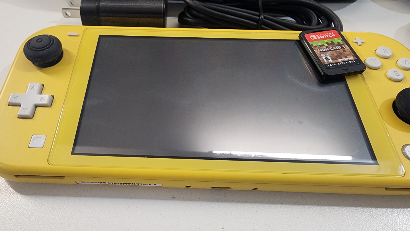 Yellow Nintendo Switch Lite with Minecraft, Case & Charger