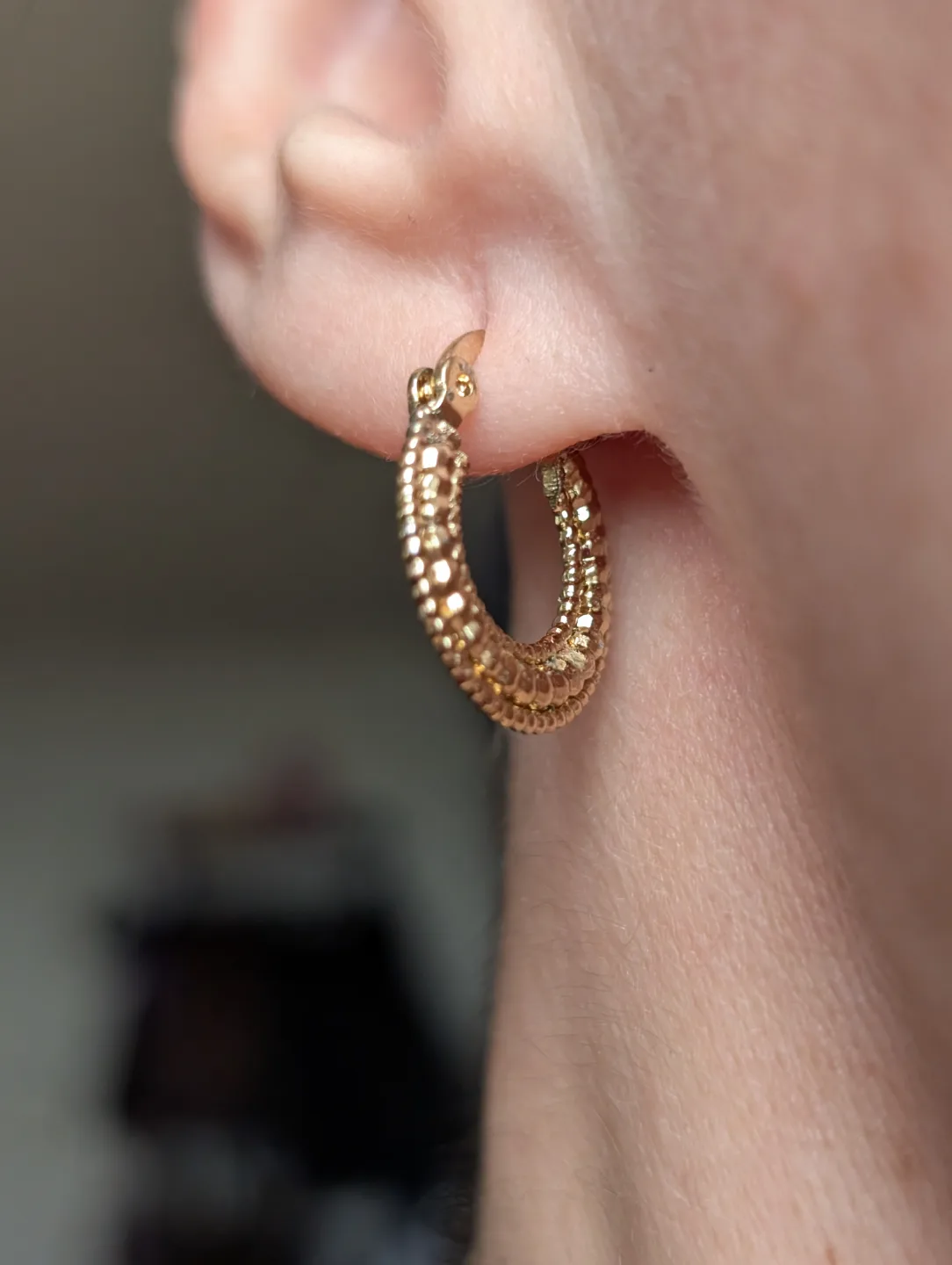 Small Gold Tone textured hoop earrings image indicator(6)