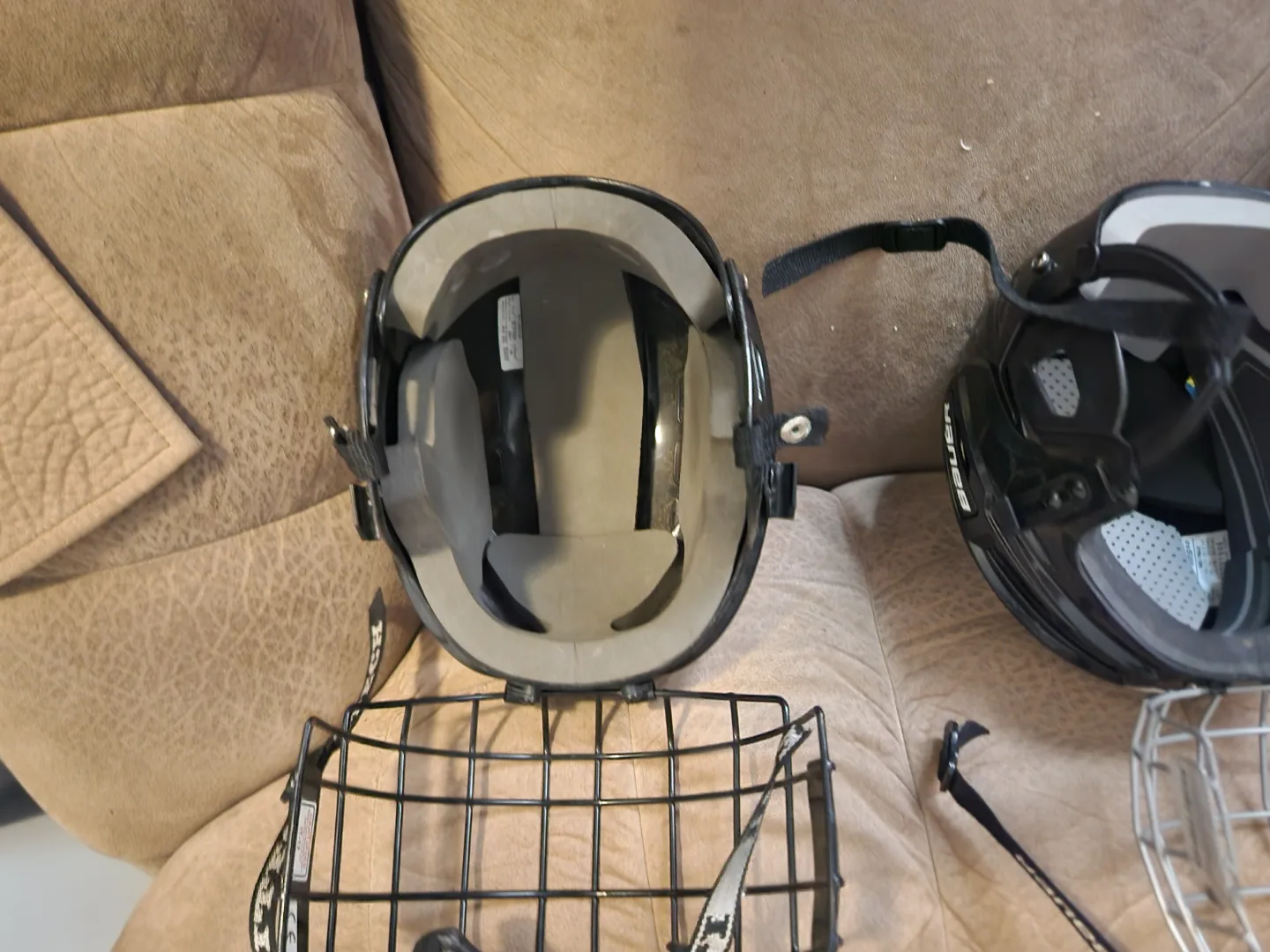 Two Used CCM Hockey Helmets with Cages image indicator(4)